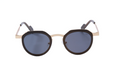 Sunglasses with dark lenses and gold frame on a white background